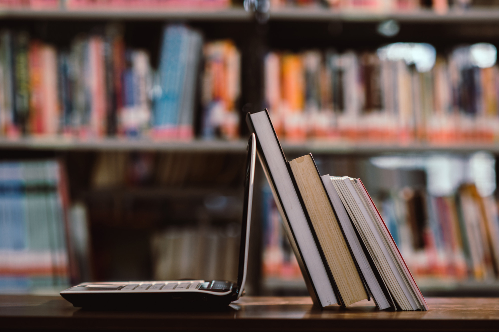 Laptop and books